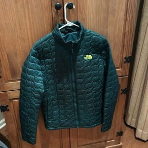 Green North Face Jacket, size men’s small.